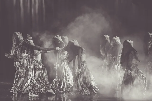 A belly dance class working on hip isolations in Brighton